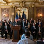Utah lawmakers and LDS church leaders gathering for press conference.